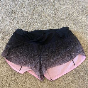 LULULEMON pink and black speed up short size 4